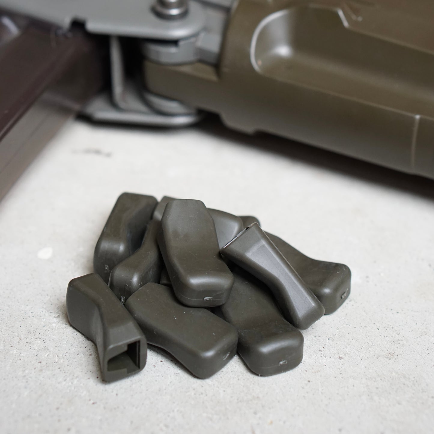 Replacement rubber for the charging handle of the SIG SG55X series rifle - color green